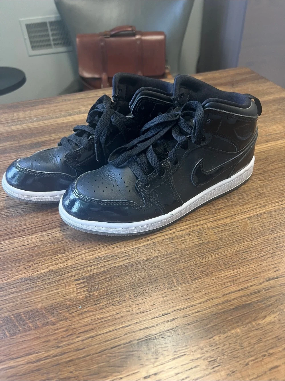 Black Nike High-Top Sneakers with White Sole - size 3